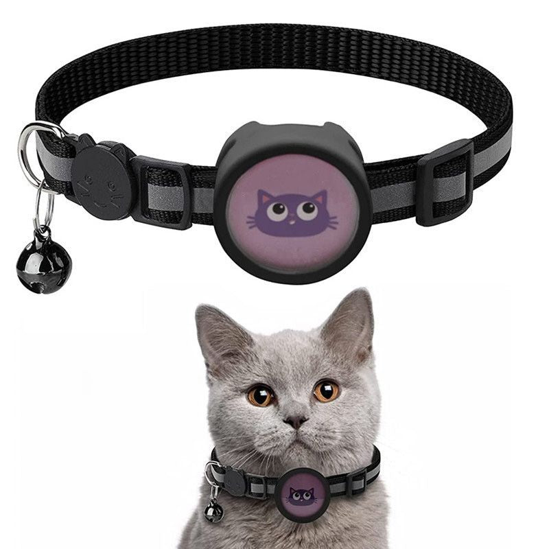 Black adjustable AirTag pet collar with cat face design and bell, shown on gray cat
