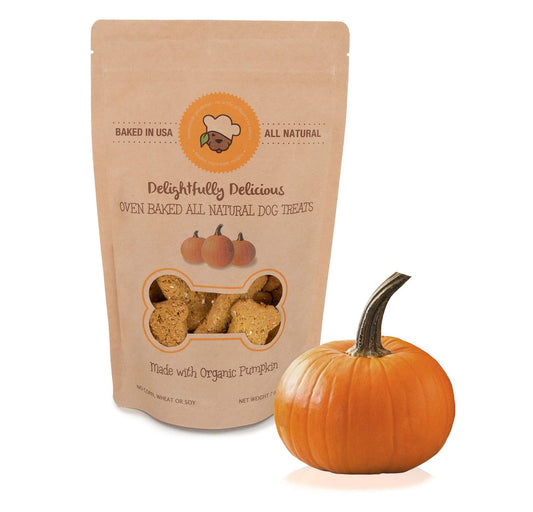 PawCounter.com all natural dog treats USA oven baked with organic pumpkin next to a pumpkin