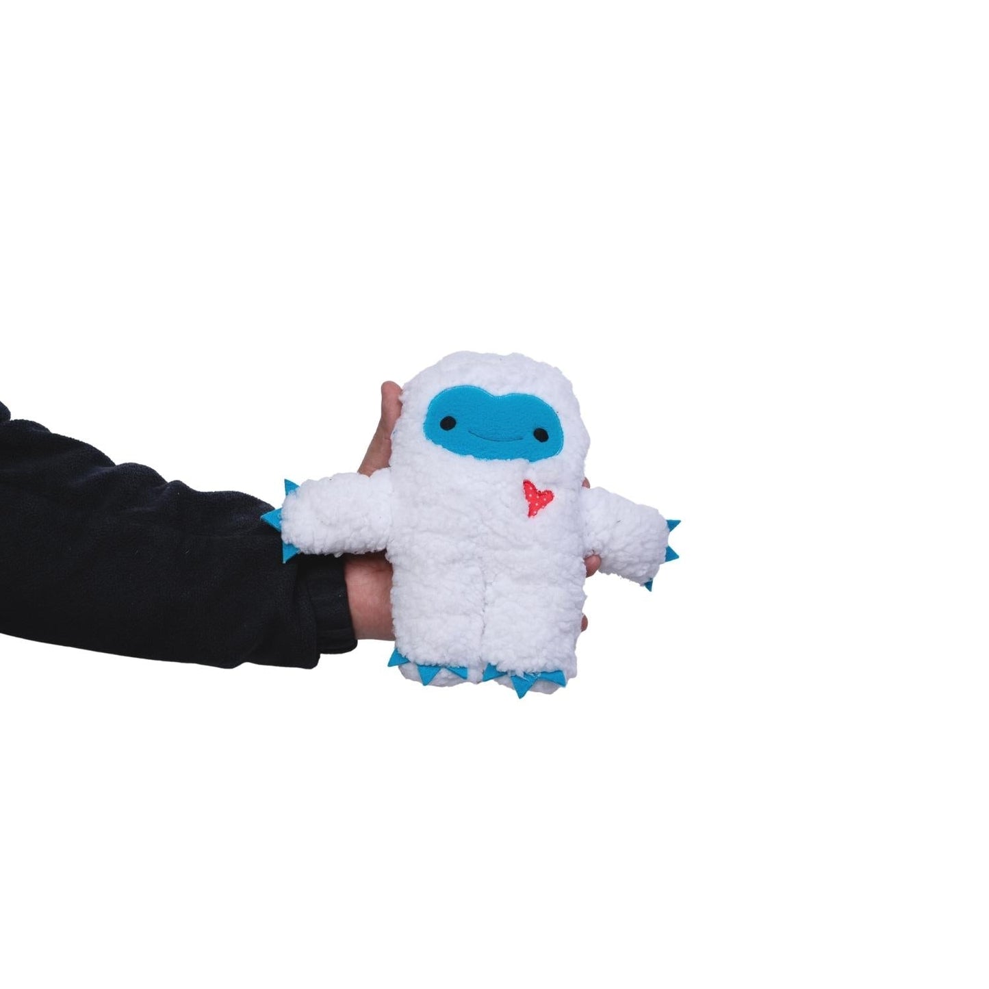 American Pet Supplies yeti plush dog toy set held by hand with white soft fabric and blue face