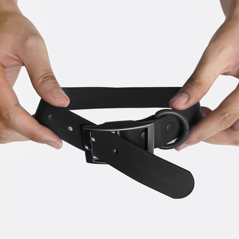 Hands adjusting a durable dog collar by Come Here Buddy for comfort and security