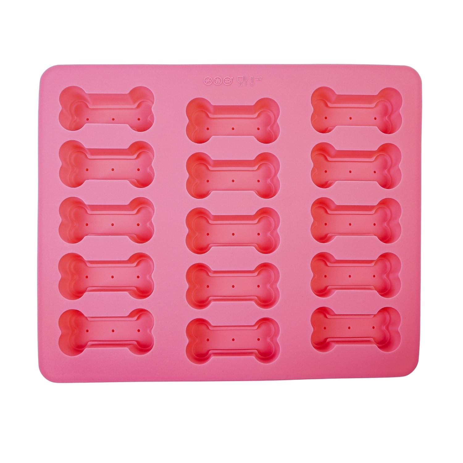 Pink dog bone silicone treat baking tray with 15 bone-shaped molds for pet treats