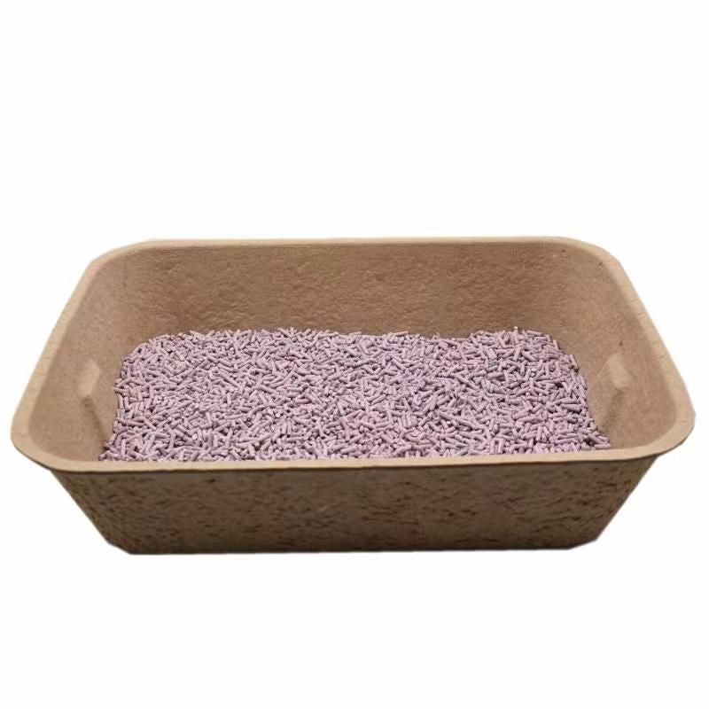 Eco friendly disposable cat litter box made from biodegradable materials filled with lavender scented pellets