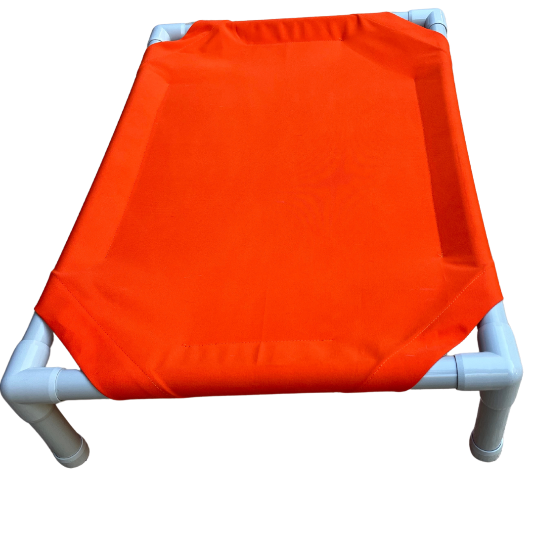 Bright orange elevated dog bed with sturdy PVC frame for comfort and support