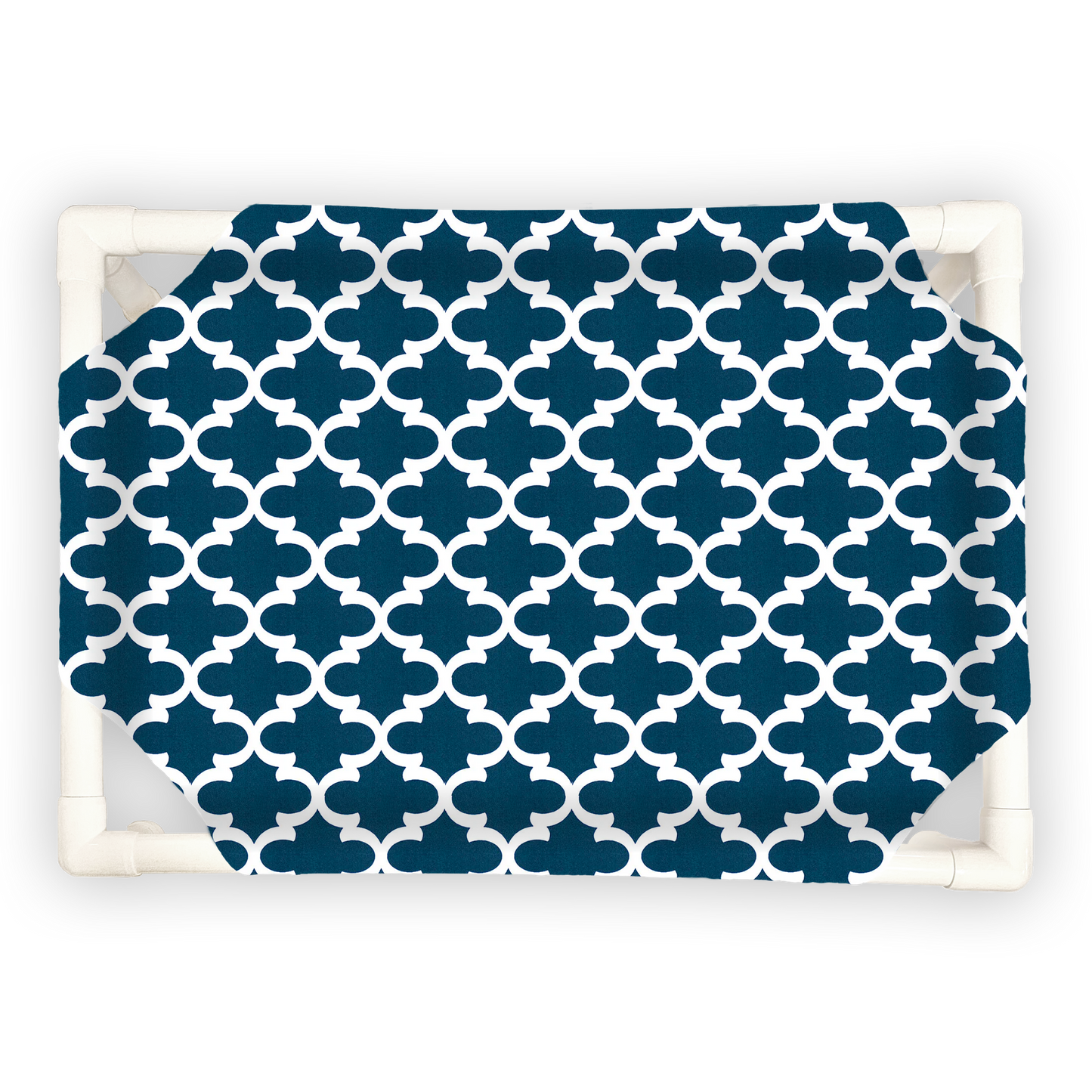 The Family Pet elevated pet bed with navy blue and white geometric patterned fabric and white PVC frame