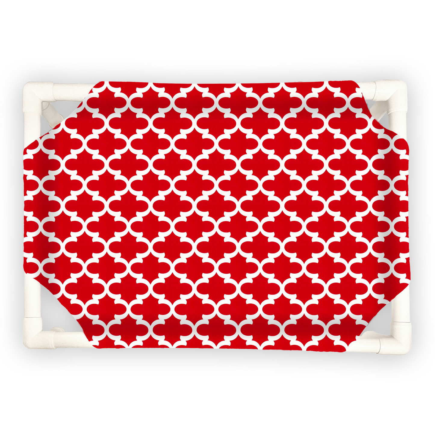 The Family Pet elevated pet bed with white frame and red patterned fabric cover
