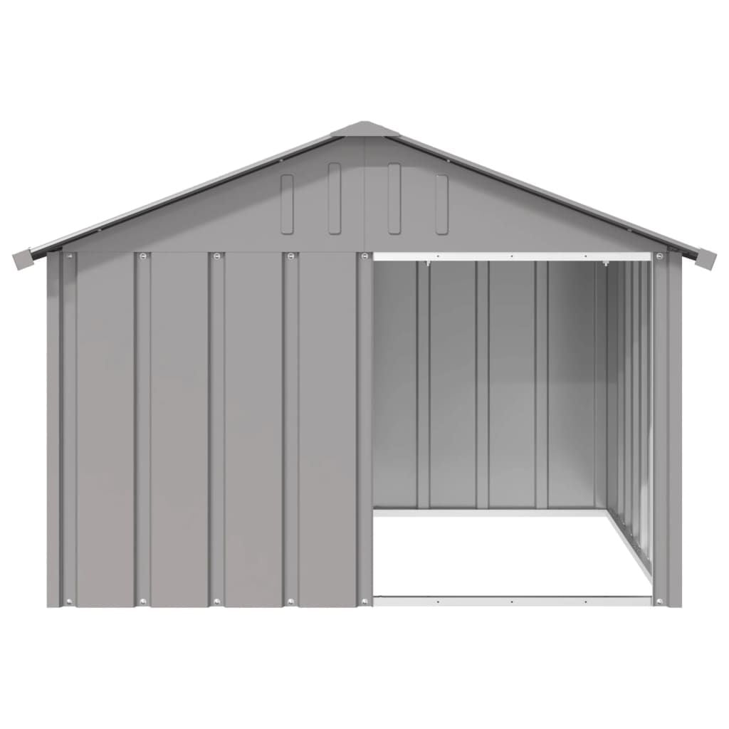 Gray galvanized steel dog house with pitched roof and open entrance for outdoor use