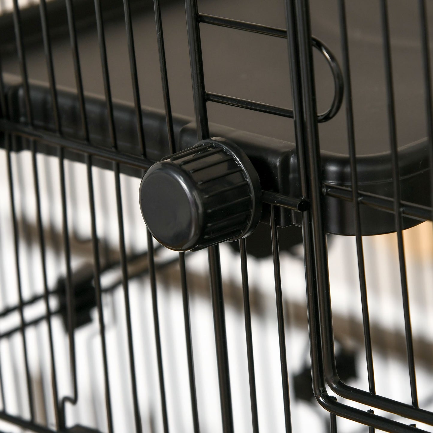 Close-up of locking mechanism on black 6 tier small animal cage from PawCounter.com