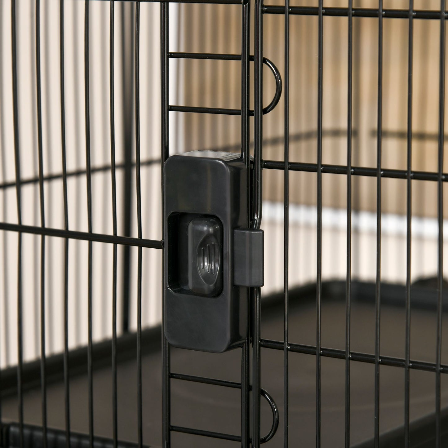 Close-up of black latch on 6 tier small animal cage for secure pet enclosure