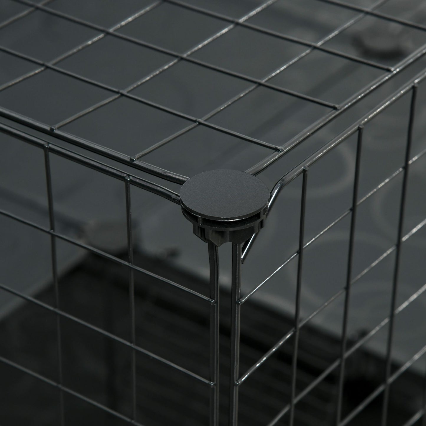 Close-up of a guinea pig playpen with door featuring durable metal wire construction and secure connections