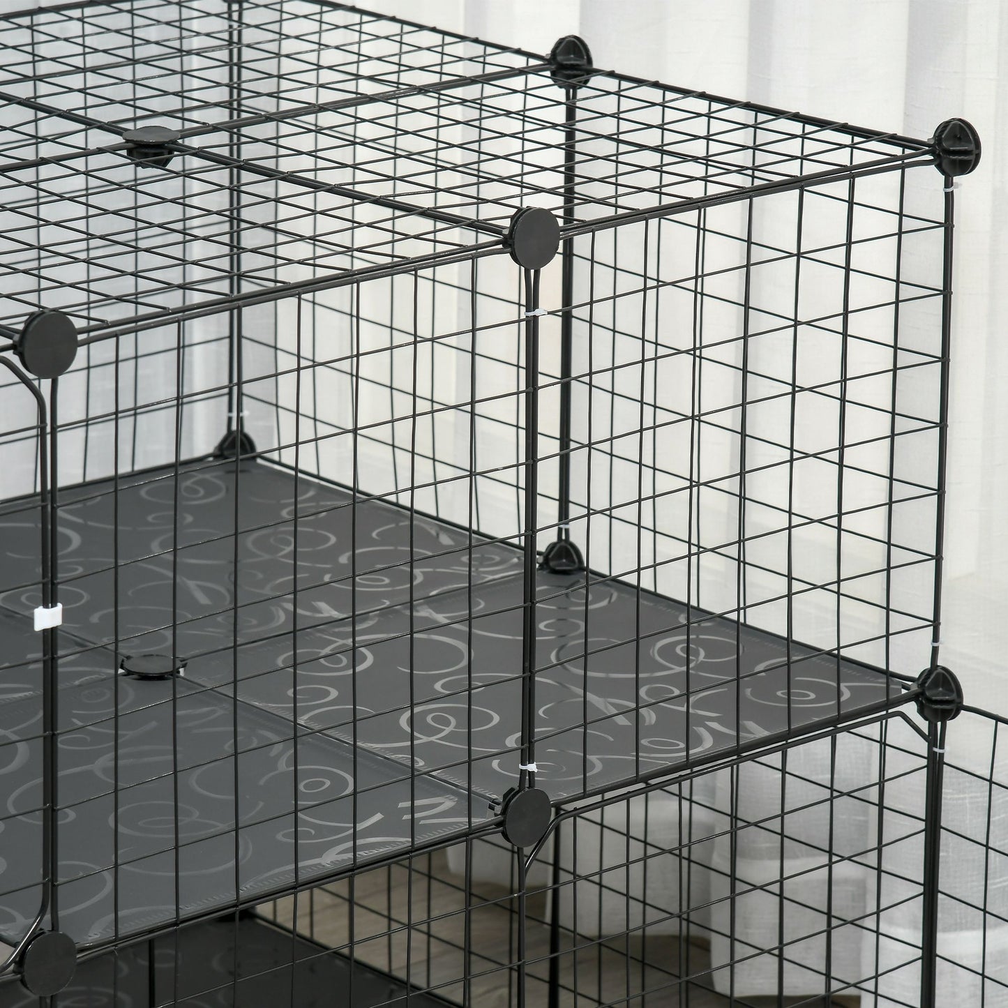 Black guinea pig playpen with door featuring spacious multi-level design for pet safety and comfort