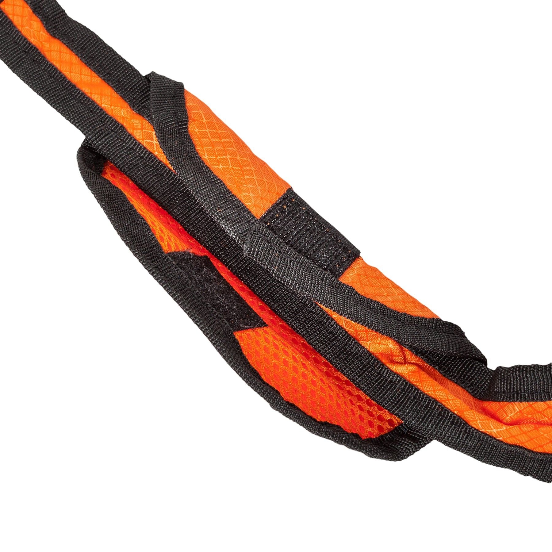 Close-up of orange and black hands free dog leash with pouch showing durable fabric and stitching