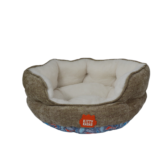Cozy Kitty Kasa Bolster Cat Bed with plush interior and unique print for comfortable lounging