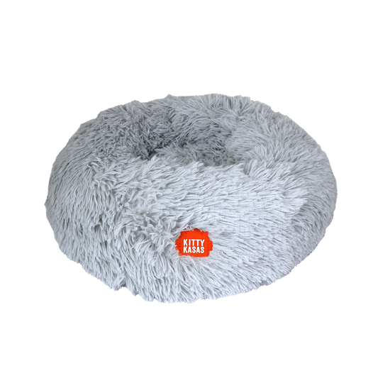 Cozy gray plush donut cat bed with soft fabric for ultimate comfort and warmth