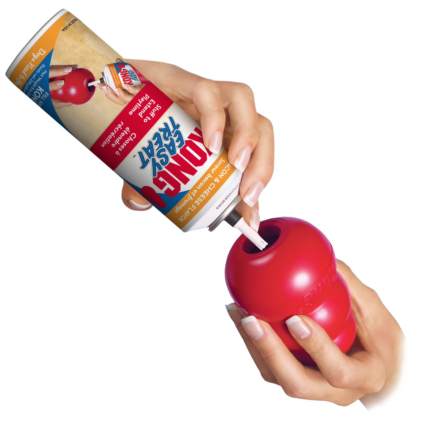 Kong Easy Treat bacon and cheese being squeezed into a red dog toy for pet treats