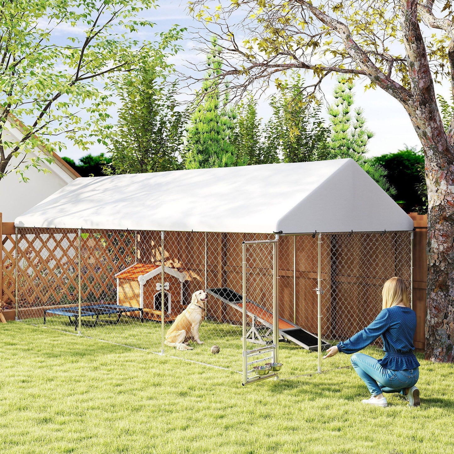 Outdoor dog kennel with cover featuring chain link panels and a white protective roof in a backyard