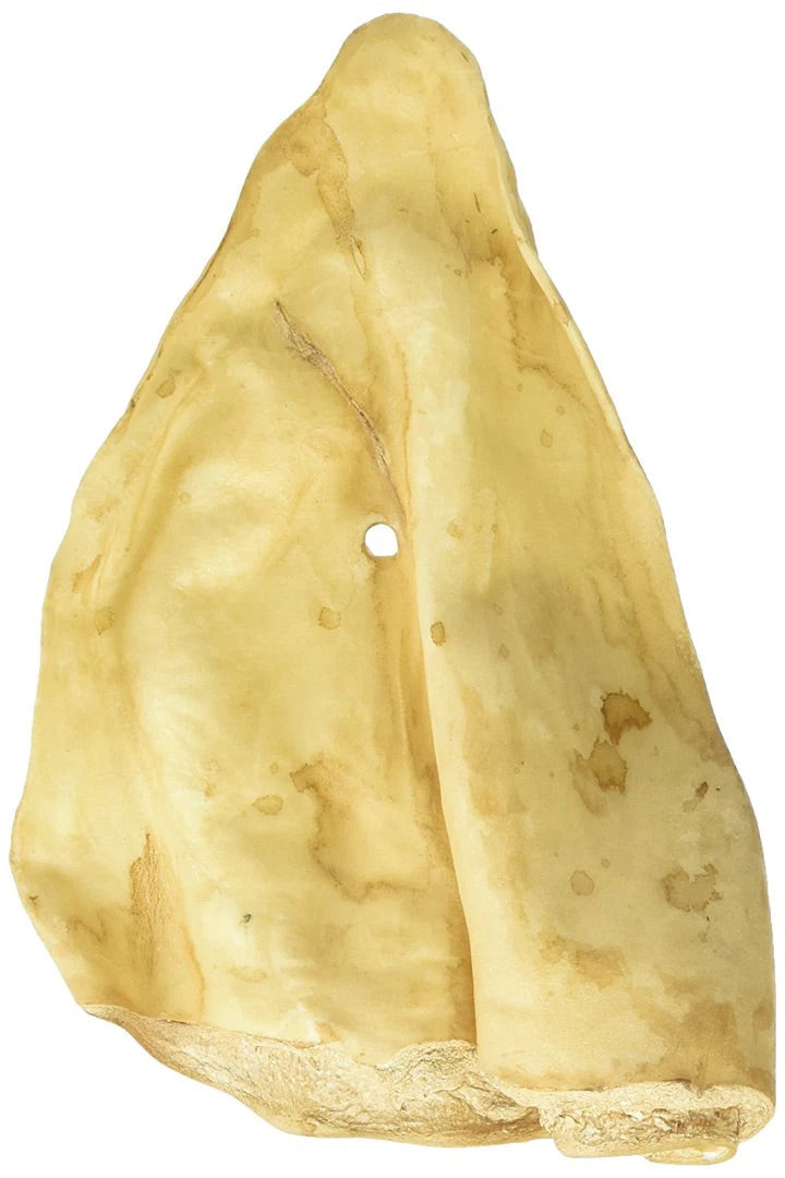 Peanut butter cow ear dog treat from The Family Pet, perfect for healthy chewing and dog enjoyment