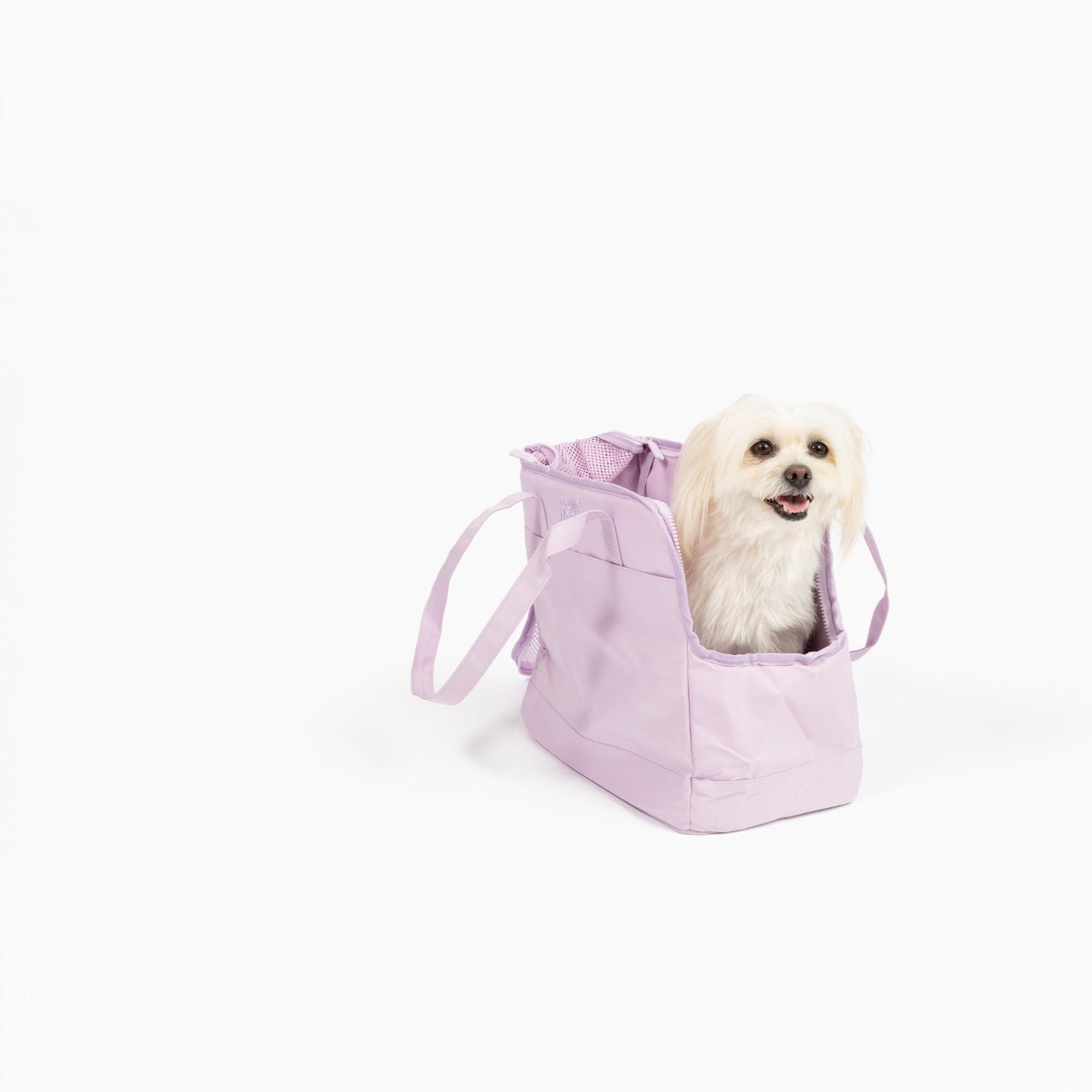 Light purple pet tote bag for dogs and cats with a happy small dog inside