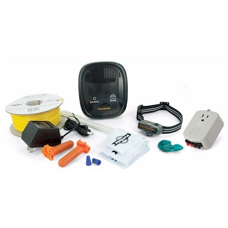 PetSafe small dog invisible fence kit with transmitter, collar, boundary wire, power adapter, and installation tools
