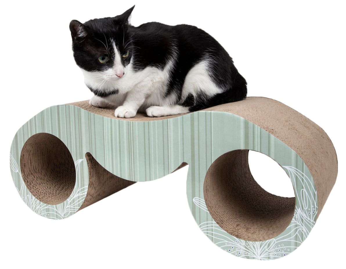 Black and white cat on PawCounter premium cat scratcher furniture with curved design and tunnel