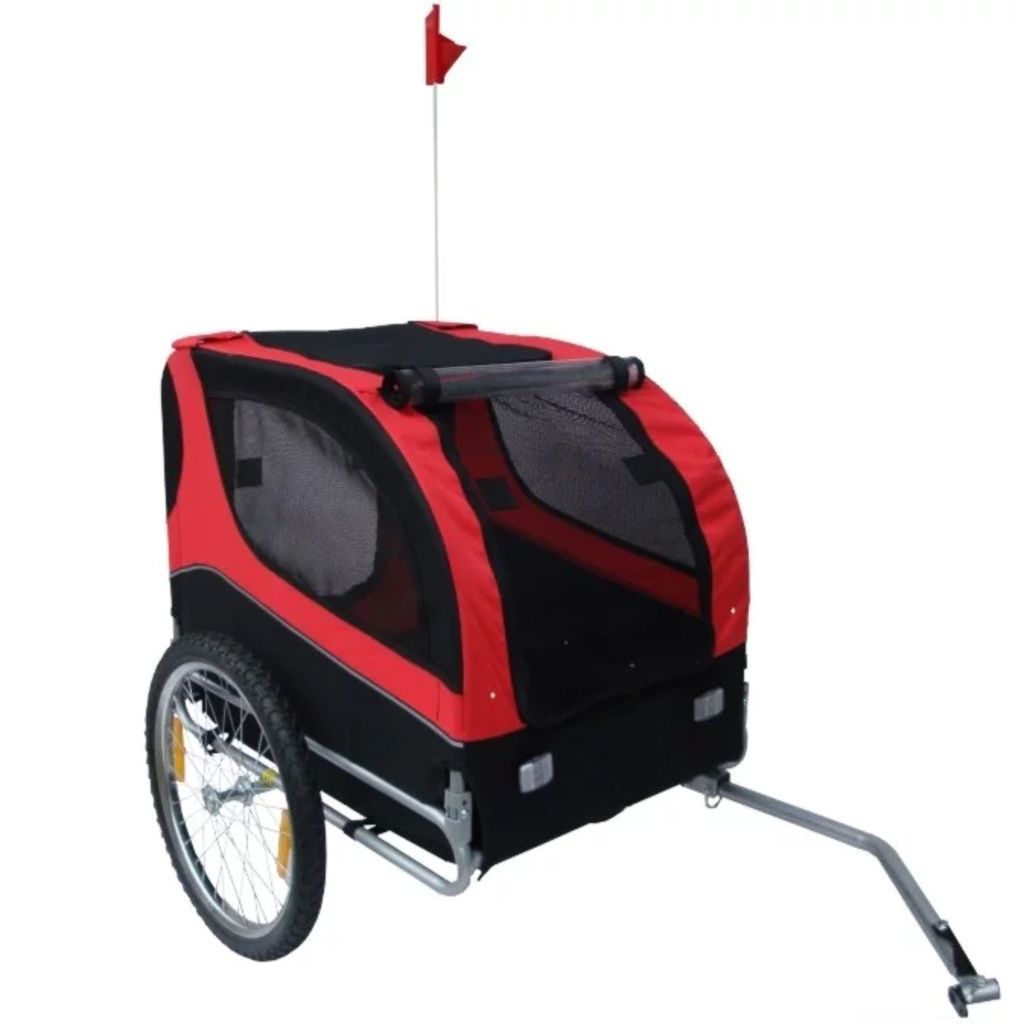 Red and black dog bike trailer with mesh windows and two large wheels for pet transportation