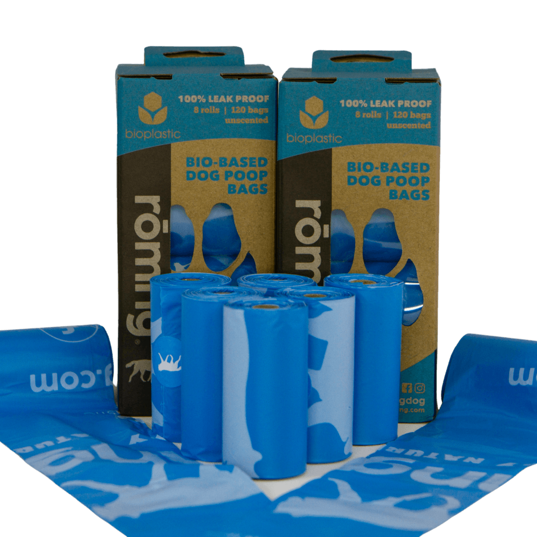 rōmng bio-based dog poop bags in blue packaging with six rolls of 120 bags for eco-friendly cleanup
