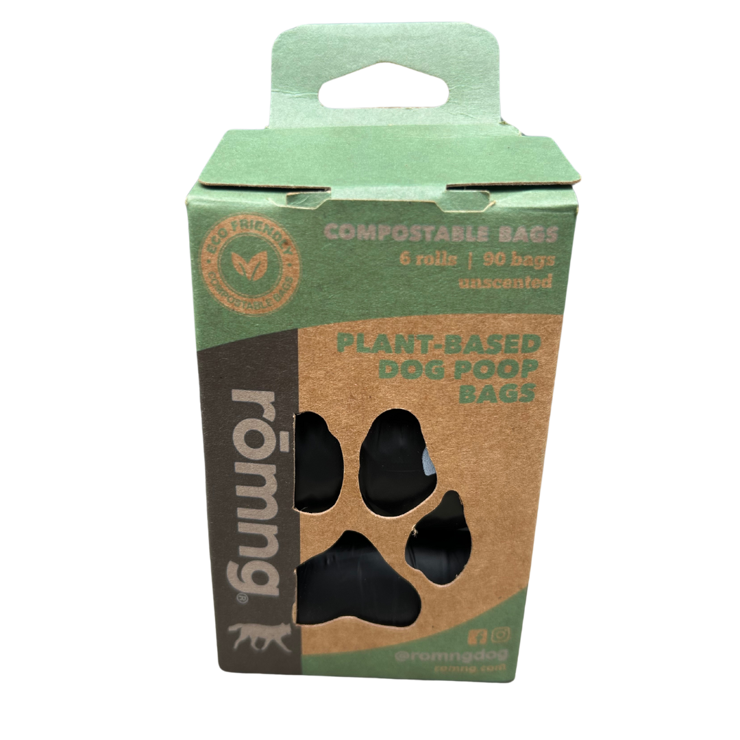 rōmng compostable dog poop bags in a cardboard packaging with 6 rolls of unscented bags