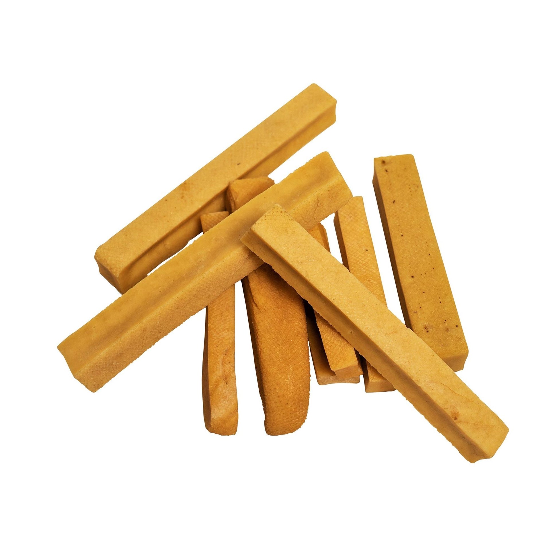 Natural himalayan yak cheese dog chew sticks stacked on white background