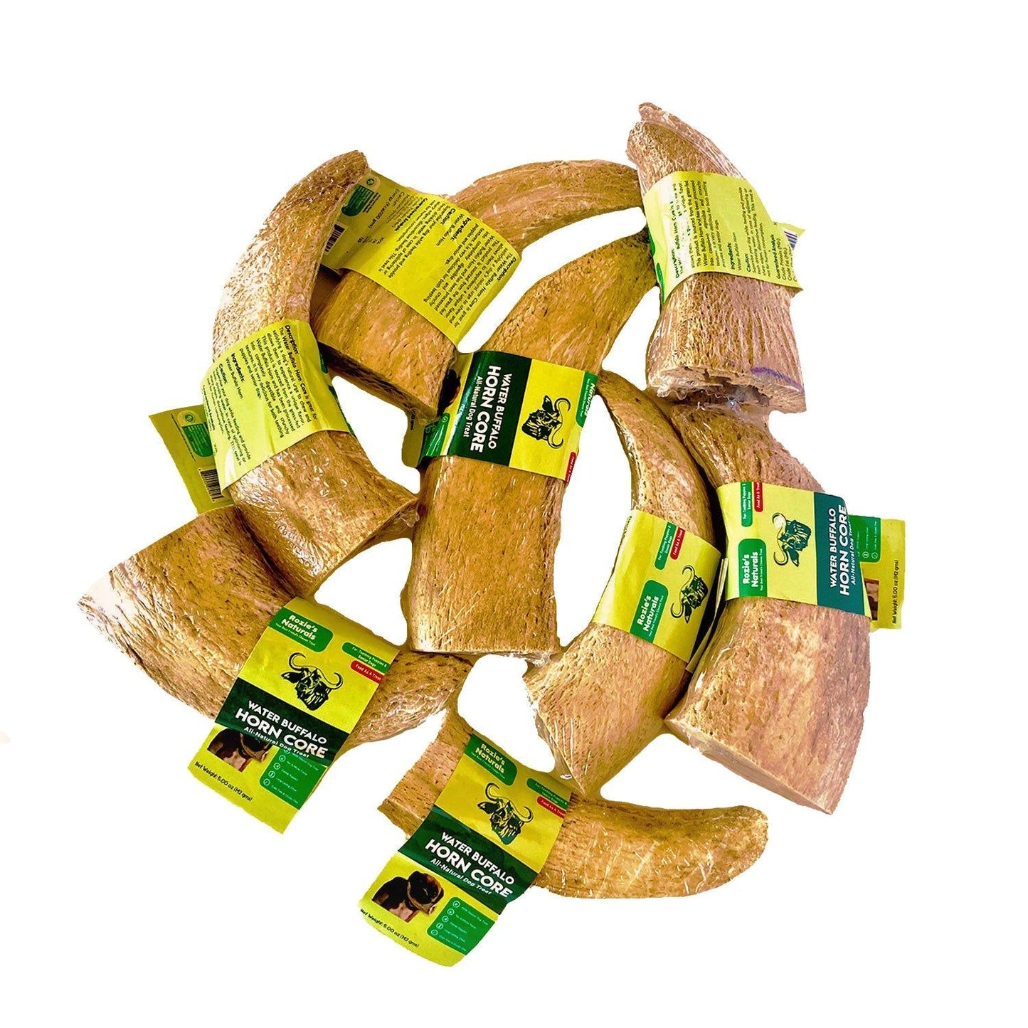 Natural water buffalo dog chews from PawCounter.com with yellow labels on multiple horn-shaped treats