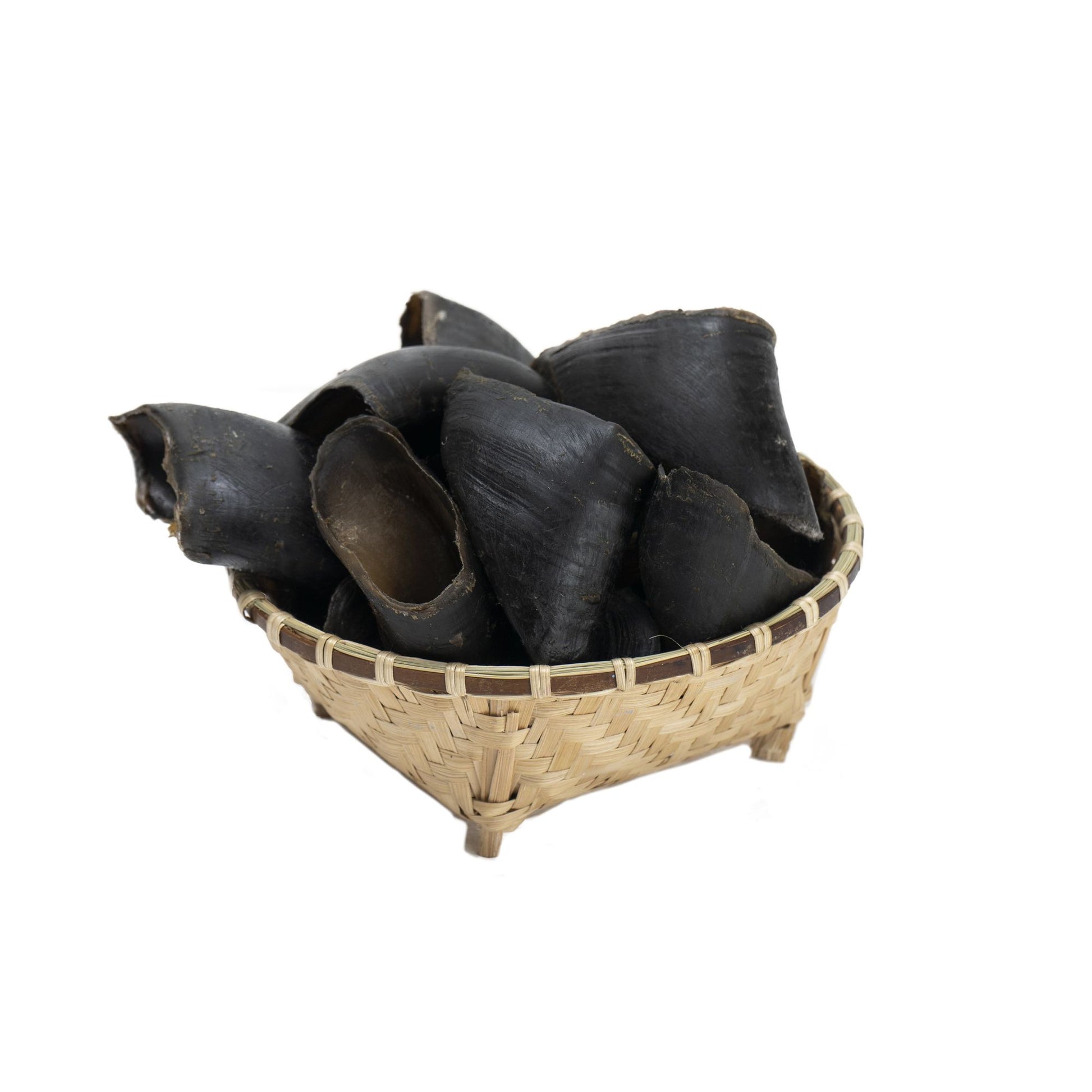 Basket filled with natural water buffalo hooves for dogs chew treats from PawCounter.com