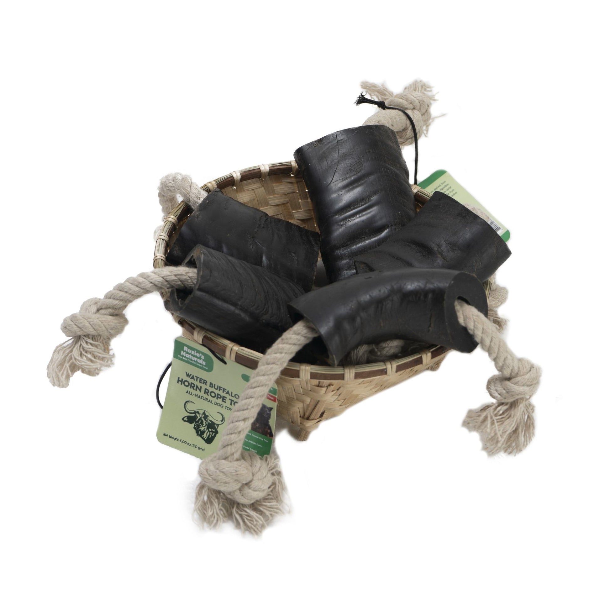 Water buffalo horn dog chew with rope attached in a woven basket from PawCounter.com