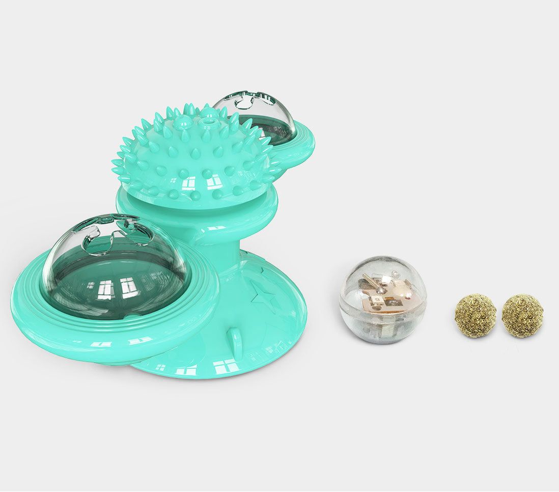 PawCounter.com turquoise spinning cat toy with textured surface and clear domes with accessories