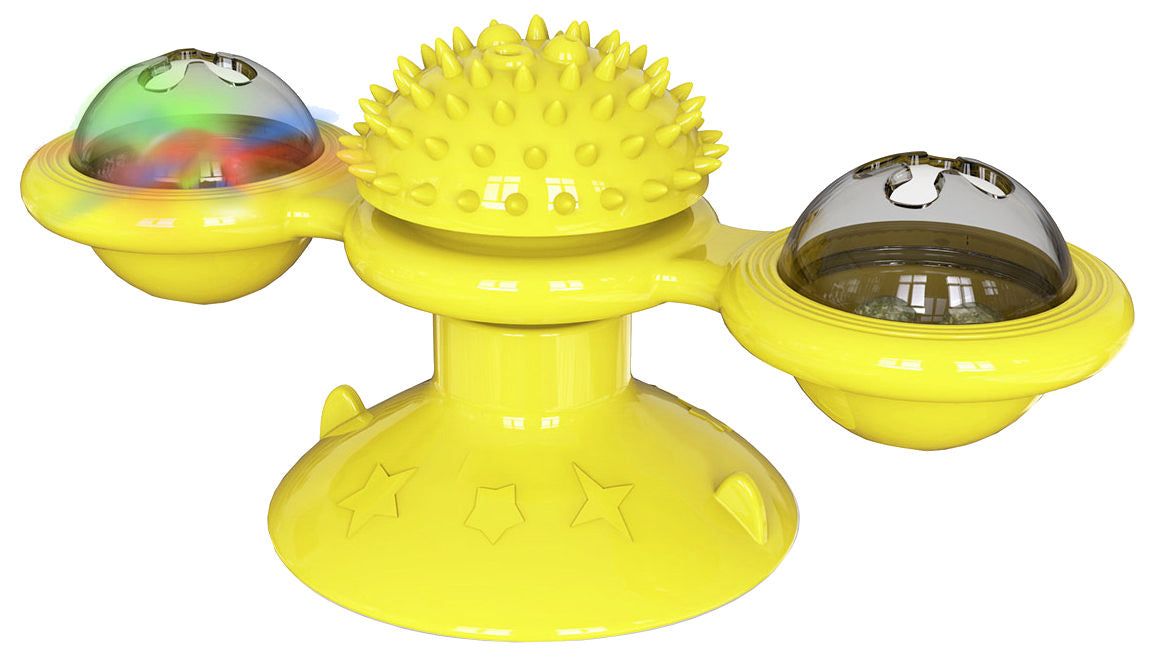 Yellow spinning cat toy with textured center and two clear domes for interactive pet play