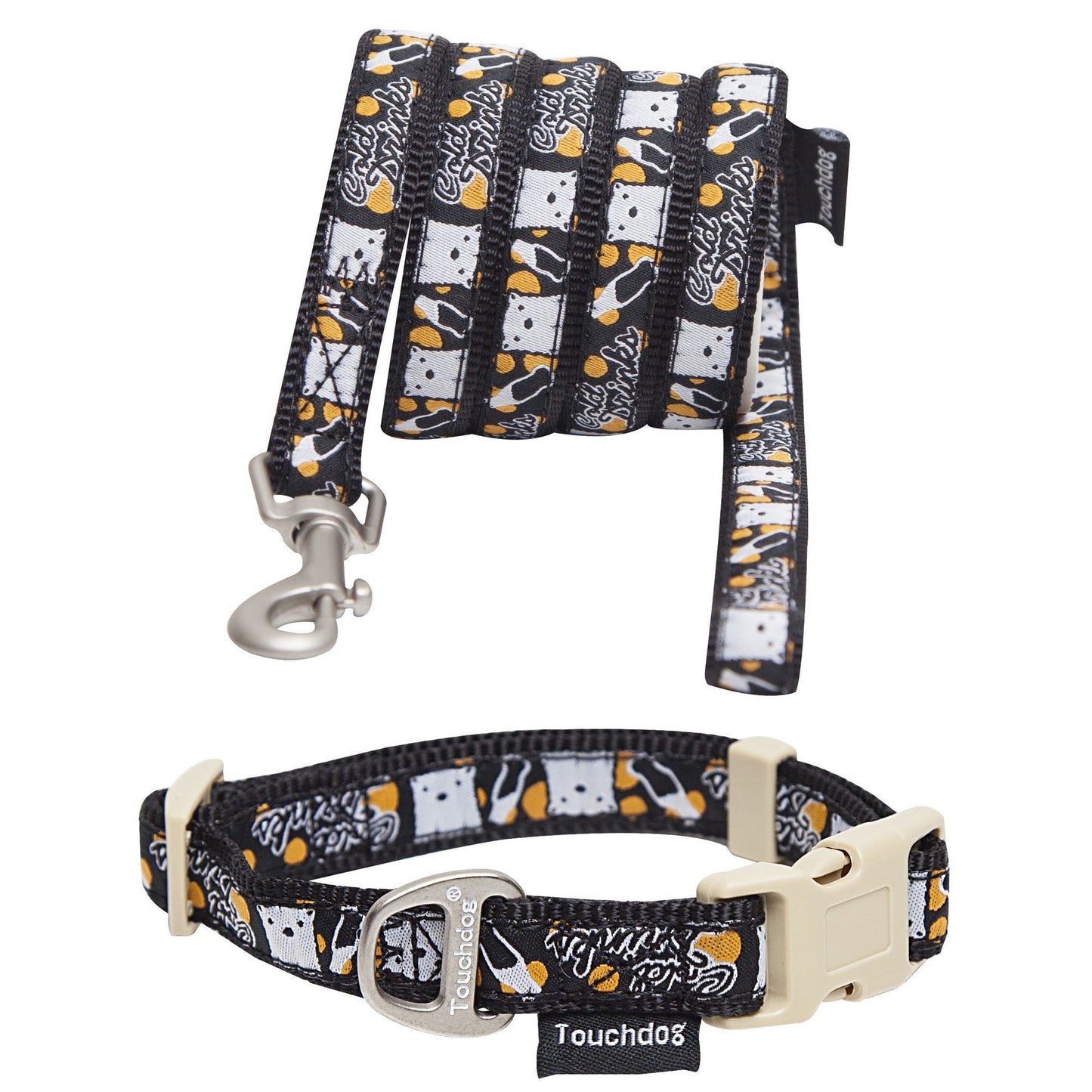 Designer dog leash and collar set with black, white, and orange bone and paw print pattern