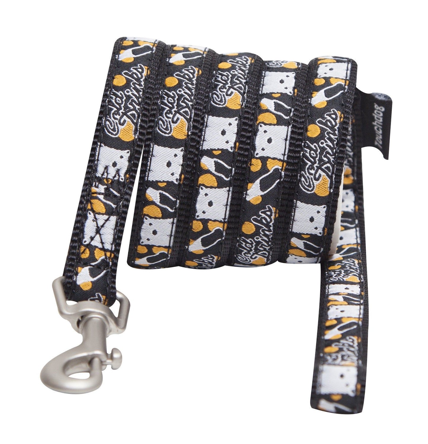 Designer dog leash and collar set with black and white pattern featuring playful dog faces and orange accents