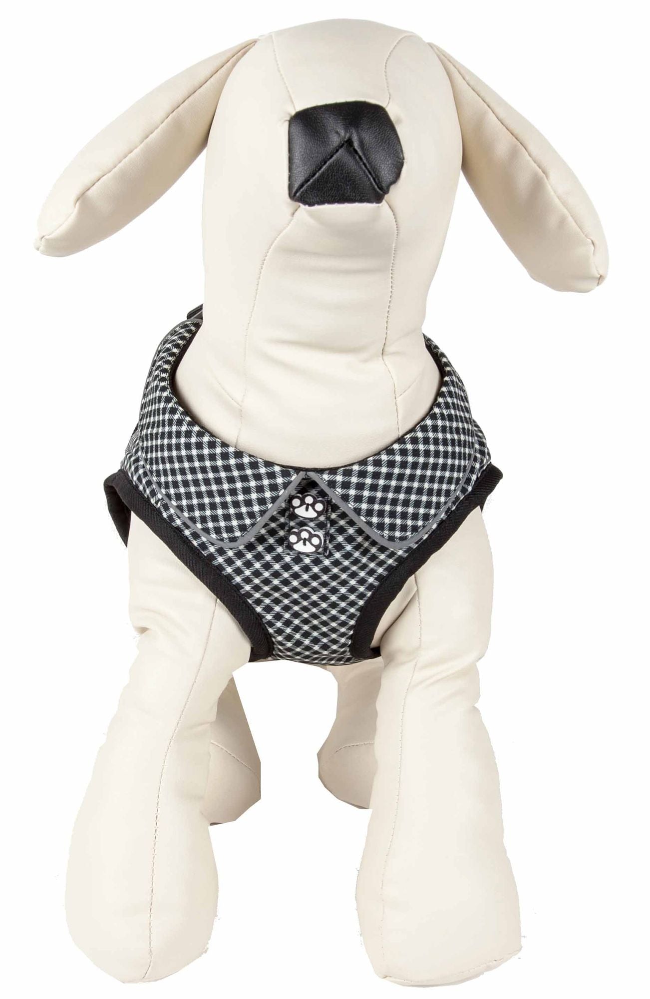 Black and white checkered adjustable dog harness with paw print buttons on a dog mannequin