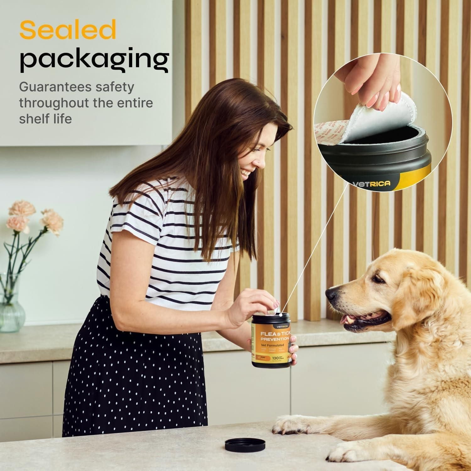 Woman holding dog flea tick prevention chews jar with sealed packaging beside golden retriever dog