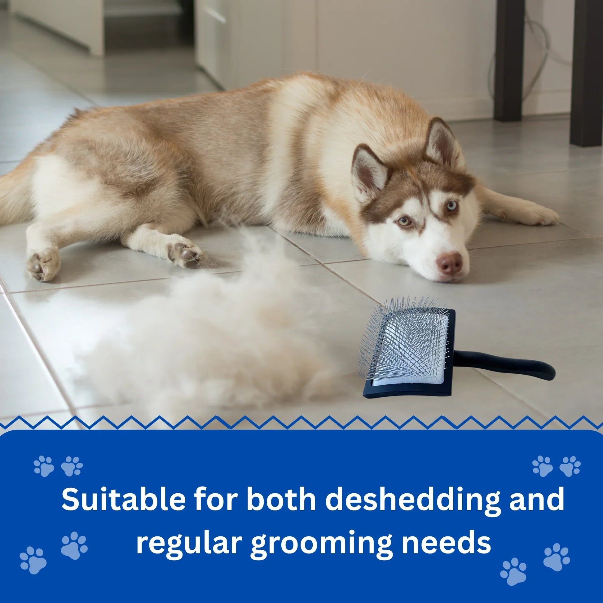 Wooden handle pet slicker brush on floor with shedding fur, ideal for regular grooming and deshedding