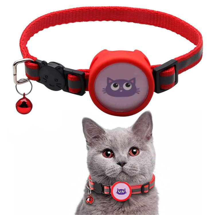 Red AirTag pet collar with cat design and bell shown on gray cat for pet tracking safety