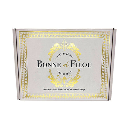 Bonne et Filou Easter dog treats gift box with gold decorative accents and luxury branding