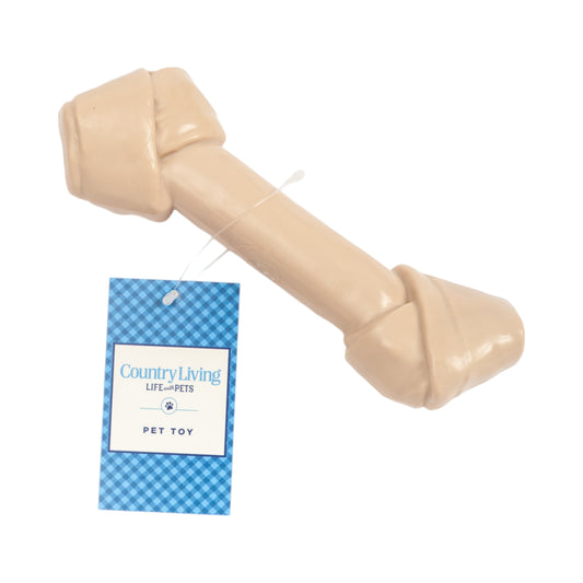 American Pet Supplies nylon bone dog chew toy in beige with attached blue Country Living pet toy tag