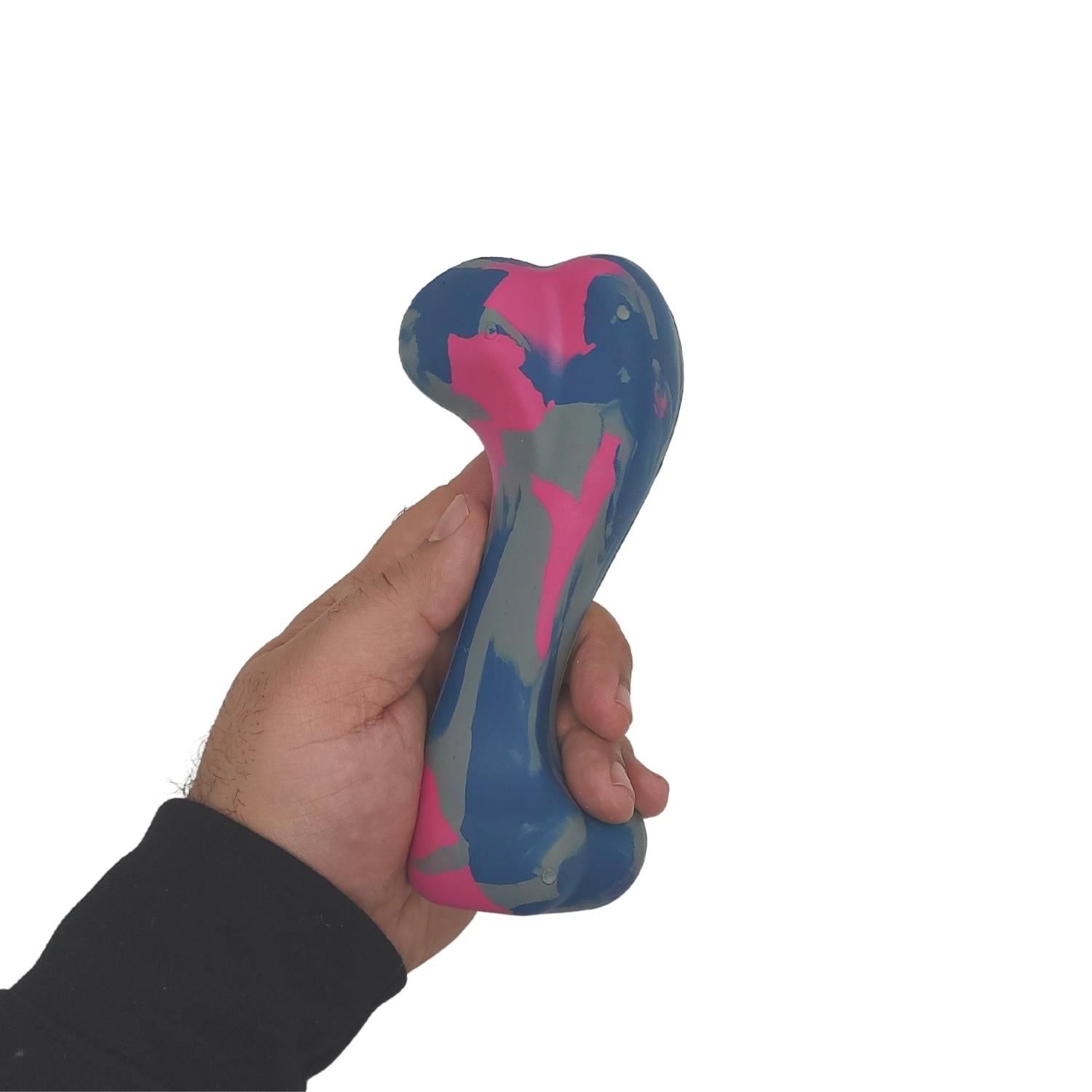 Hand holding a durable rubber dog bone toy in blue pink and gray by American Pet Supplies