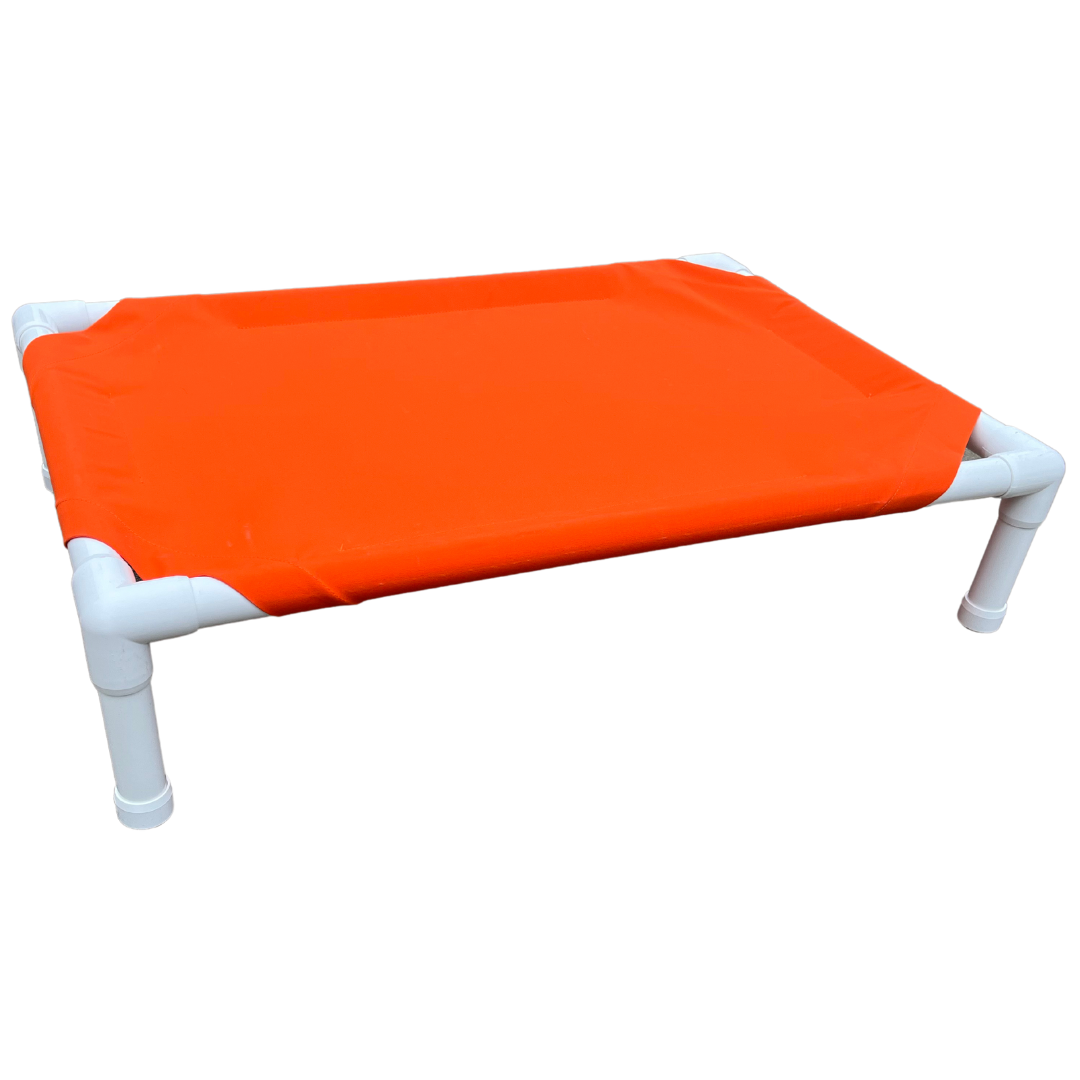 Durable elevated dog bed with an orange fabric surface and sturdy PVC frame for comfort and support