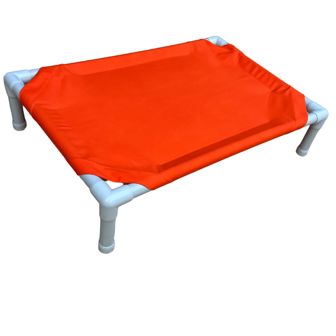 Elevated dog bed in bright orange color with sturdy frame for pet comfort and support