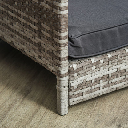 Close-up of PawCounter.com elevated wicker dog house corner with gray cushion on wooden floor