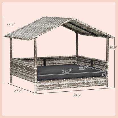 Elevated wicker dog house by PawCounter.com with canopy roof and cushioned bed for pet comfort