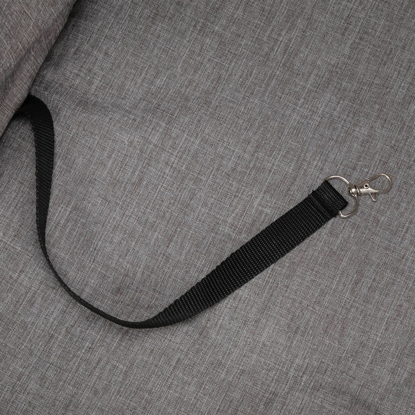 Black safety leash strap with metal clip on grey fabric of foldable pet stroller