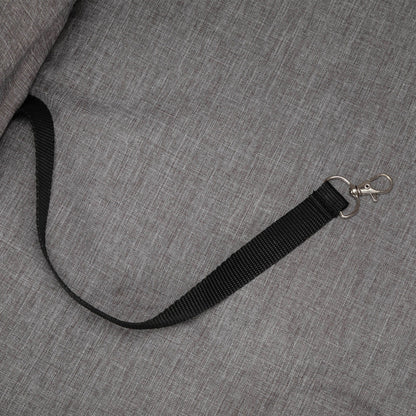Black safety leash strap with metal clip on grey fabric of foldable pet stroller