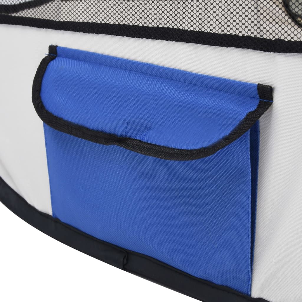 Blue storage pocket on PawCounter.com foldable dog playpen made with durable fabric and black trim
