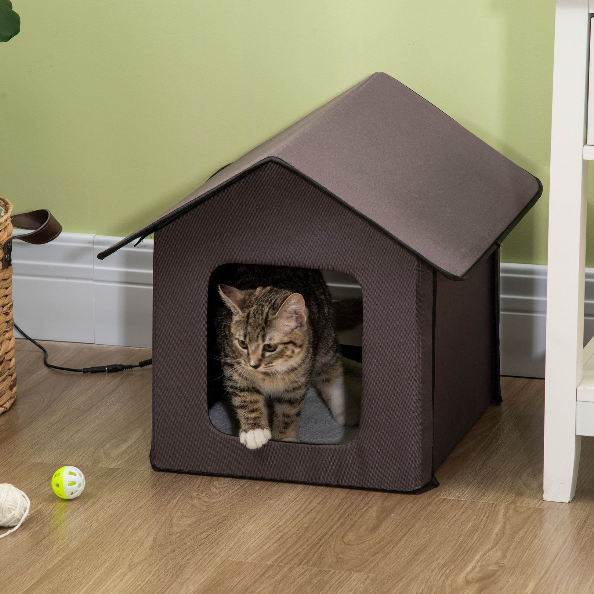 Cozy heated cat house for outdoor use with a spacious entrance for comfort and protection