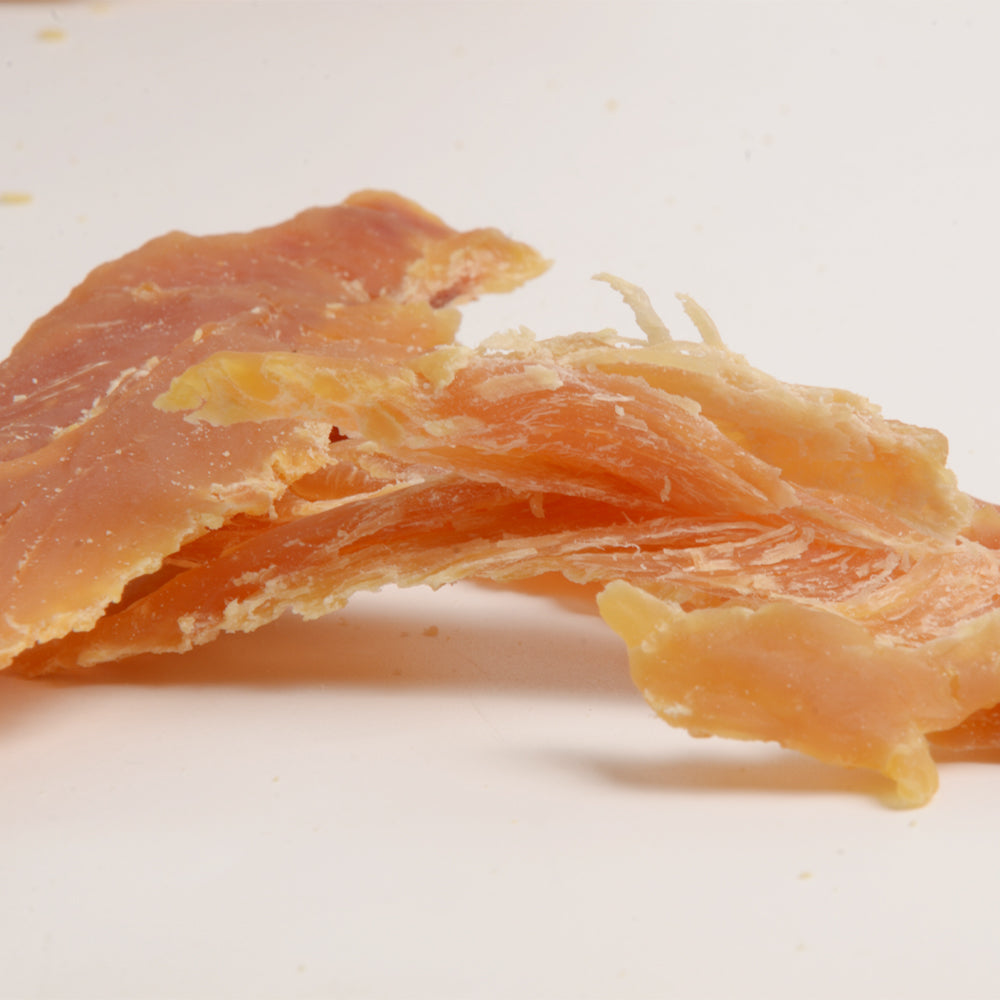 American Pet Supplies chicken breast dog treats close-up of natural dried chicken pieces for dogs